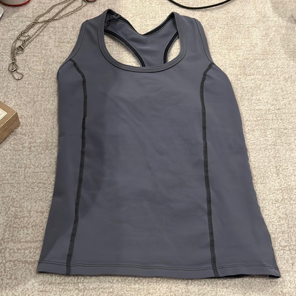 margarita racerback tank top with back cut out, hugs all of body in right places